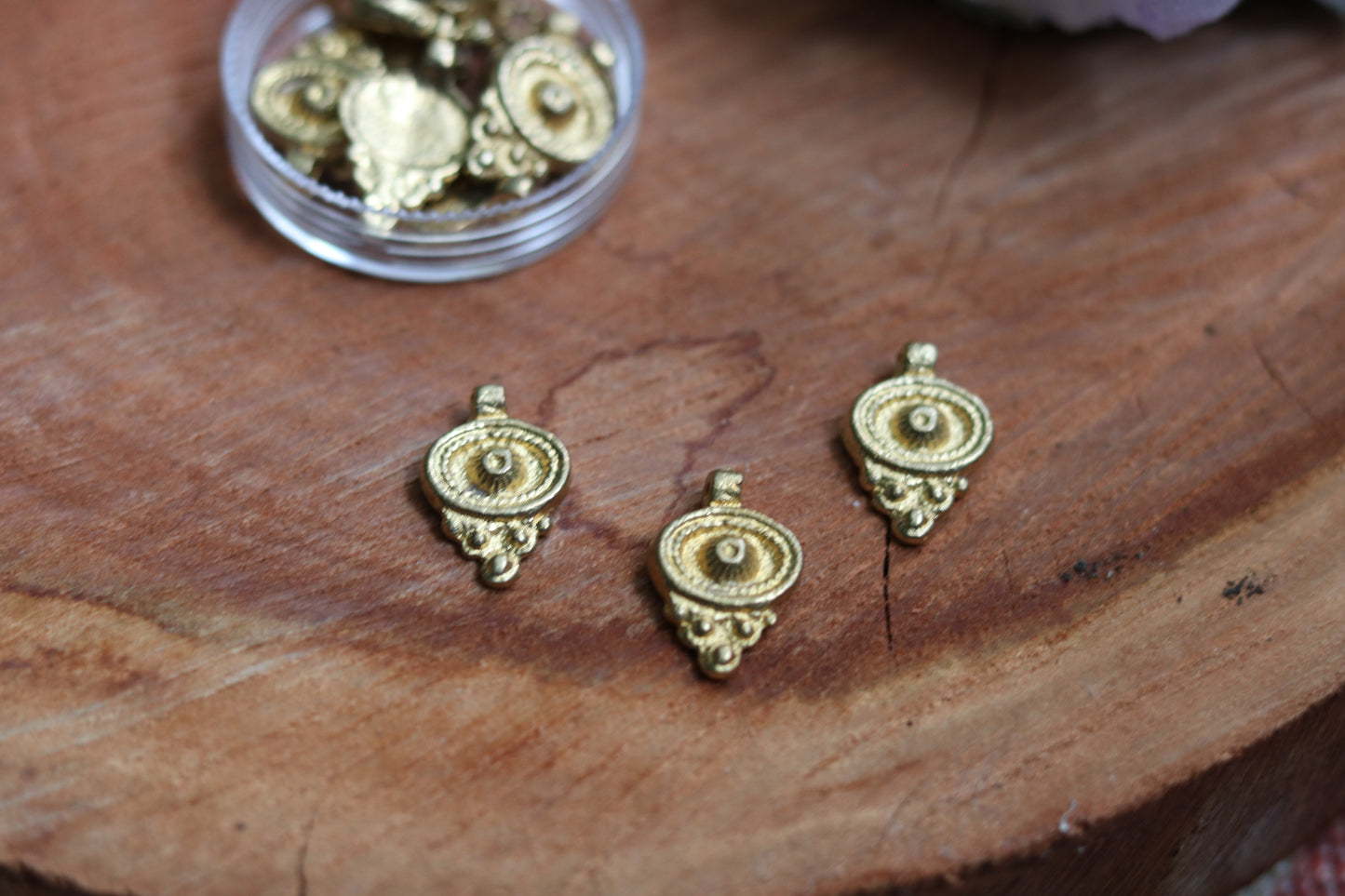 Brass charms