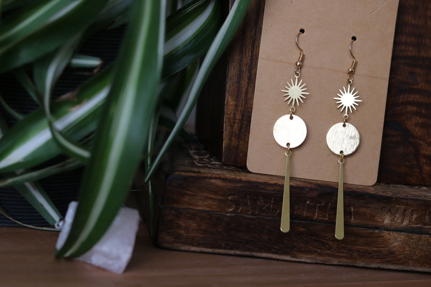 Brass earrings with star and long charm