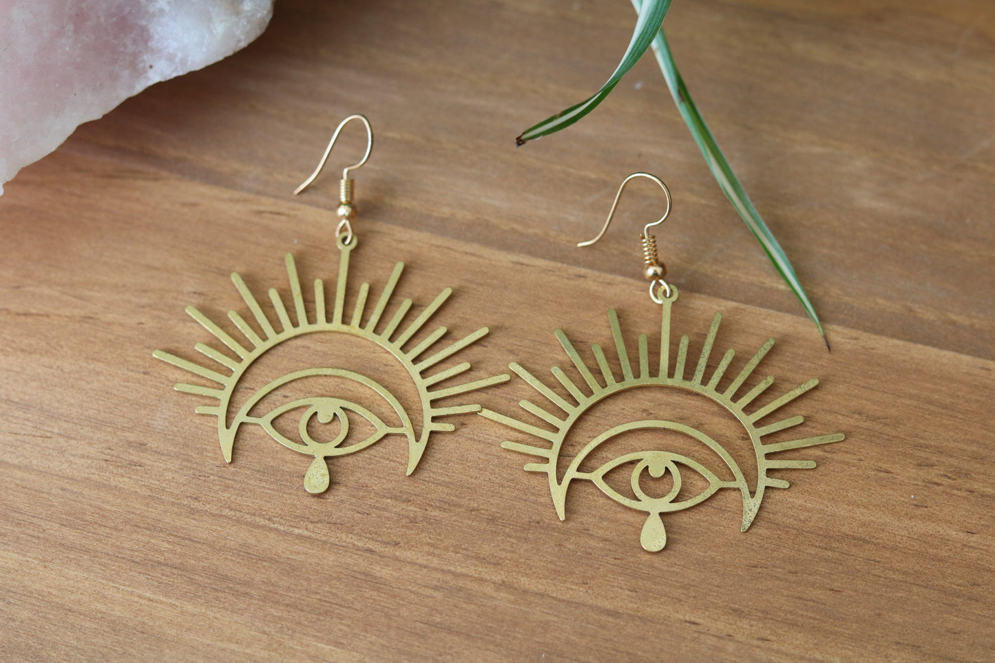 Brass earrings with eye charm