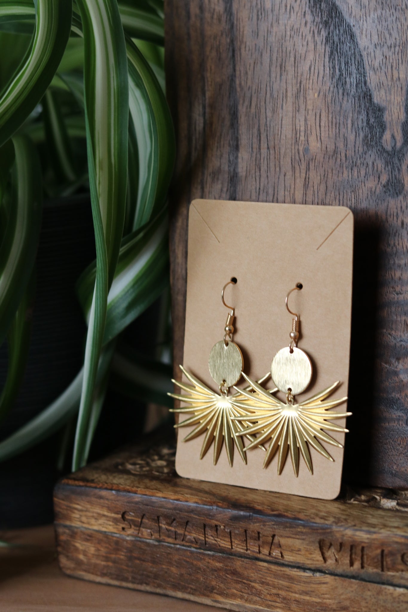 Brass earring with star shaped charm