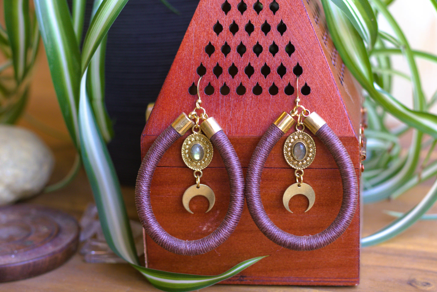 Brown earring with charms