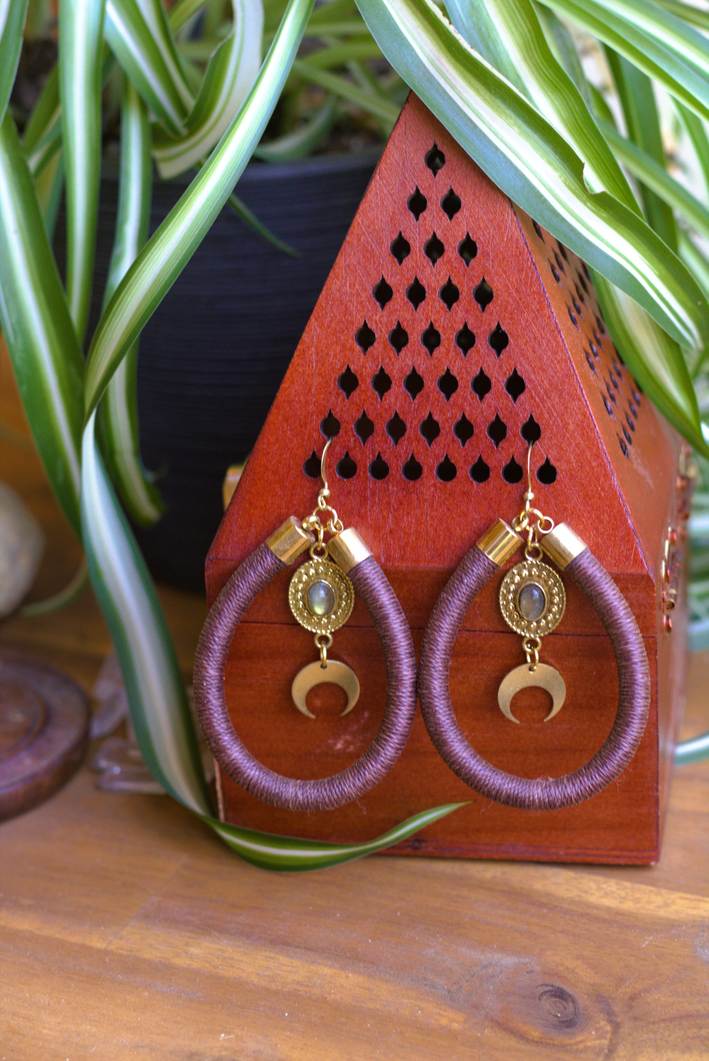 Brown earring with charms